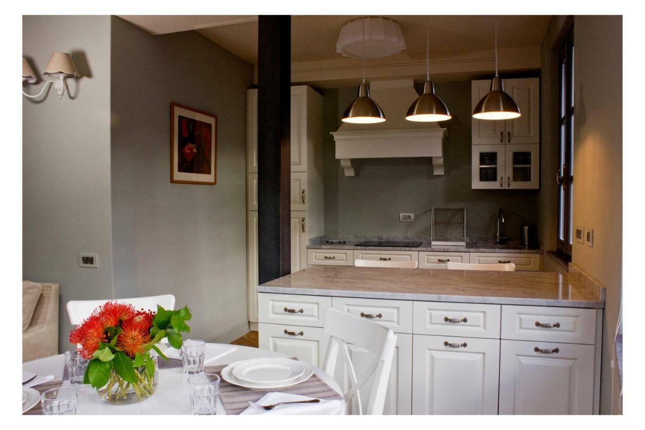 Isola Bella Apartments - Via Della Posta สเตรซา ภายนอก รูปภาพ