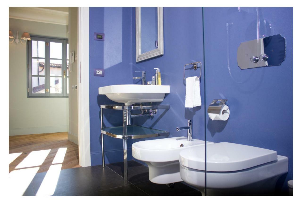 Isola Bella Apartments - Via Della Posta สเตรซา ภายนอก รูปภาพ